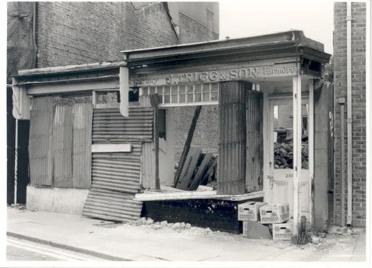 The fate of J.Trigg & Son, a local dairy shop. It used to be more common than it is now for independent dairy shops to buy milk directly from dairies and sell it door to door. This photo was taken in 1987 after the closure of their Molesey Road shop.