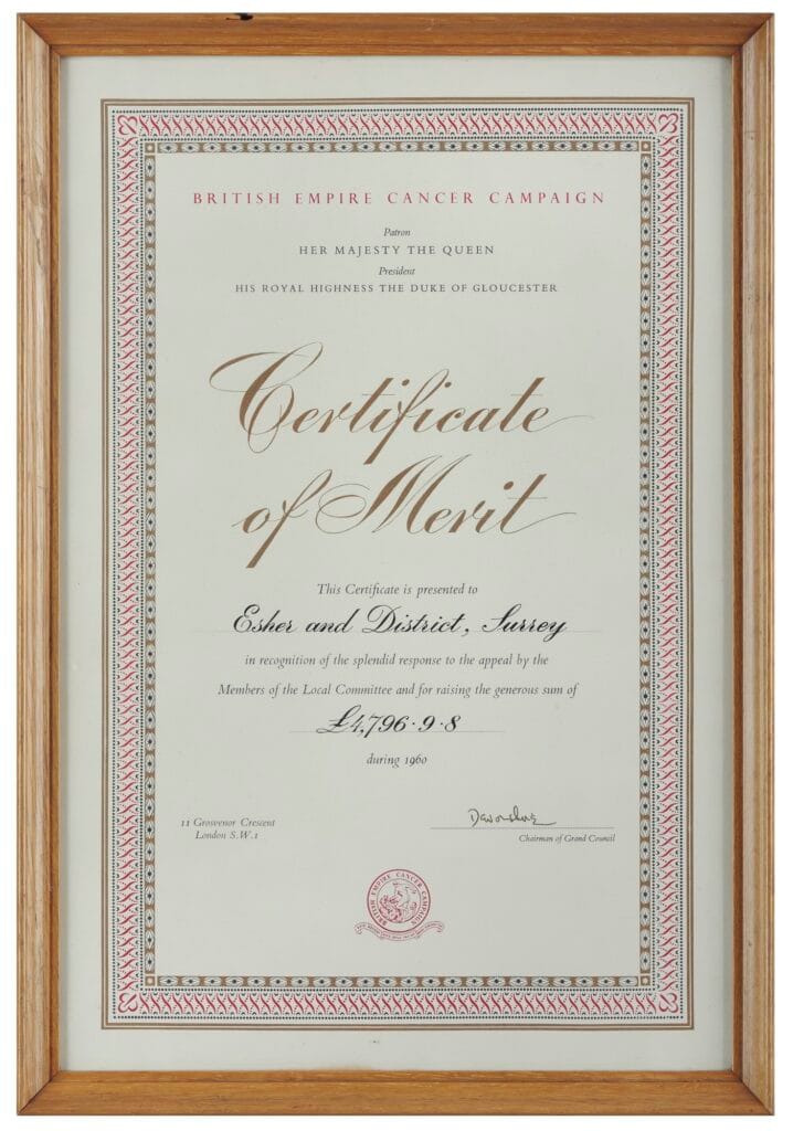 Framed Certificate of merit presented to Esher and District by the British Empire Cancer Campaign, 