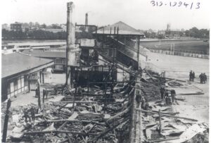 Photograph of the remains of the Hurst Park Racecourse Grandstand after the fire in June 1913.