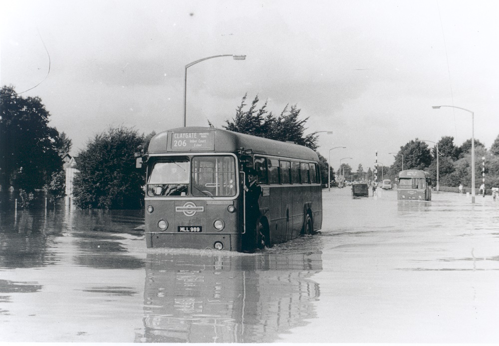 Image of flooded Hampton Court Way, No 206 Claygate bus, in flood water in Hampton Court Way, East Molesey, Sept. 1968.