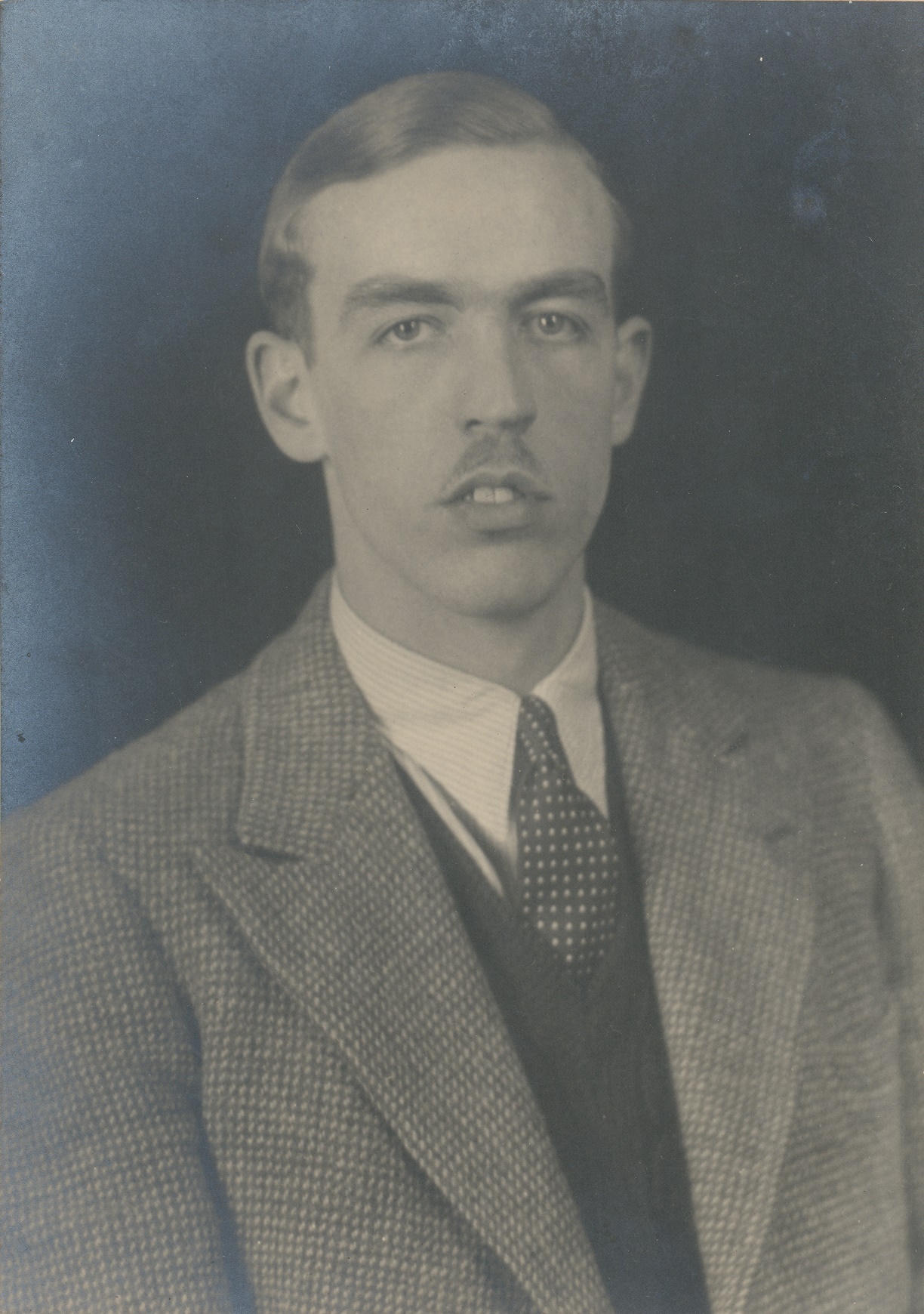 A black and white photograph of Robert John Brooke Gill, taken sometime in the 1940s when aged in his 30s.