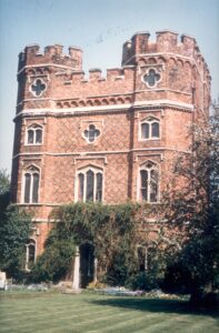 A photograph of Wayneflete Tower as seen from the river frontage, across the lawn, 1988.