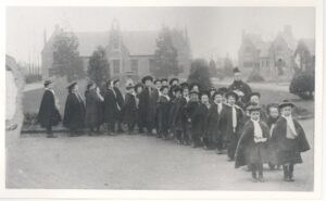 Class of girls outside school at Princess Mary Village Homes, Addlestone, 1930s