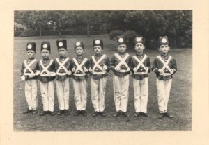 A line of boys in a production called 'The Wooden Soldier', at St James' School, Weybridge, 1930