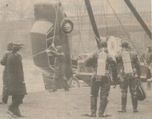 The Police Diving Team. An image of a car in which a man and a woman died was lifted from the Thames at Walton, with the police diving team watched.