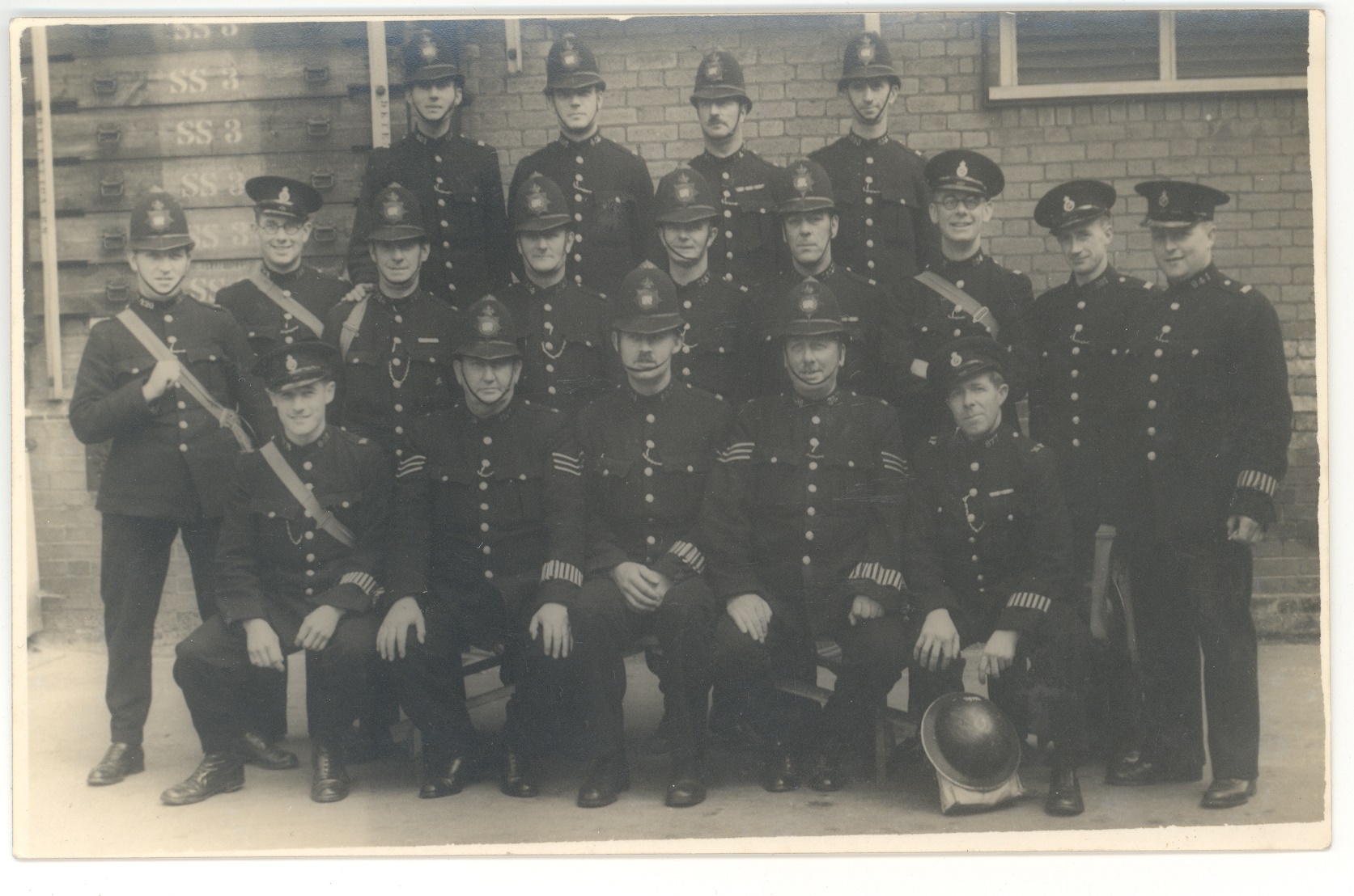 Postcard image of 18 uniformed policemen, Thames Ditton, 1939.