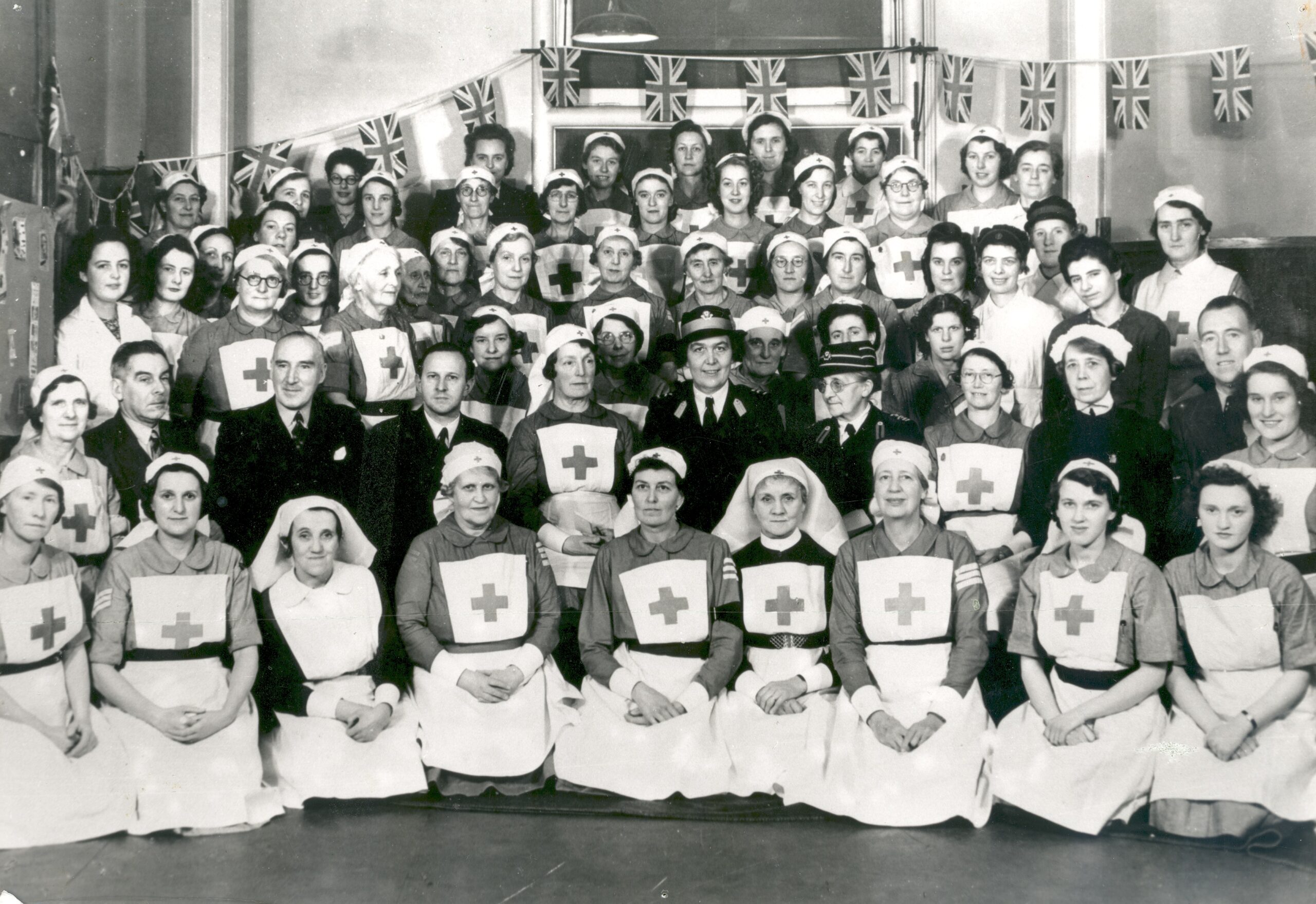 A British Red Cross Detachment with nurses, health visitors, commandants and doctors in the Locke-King clinic, 1946.