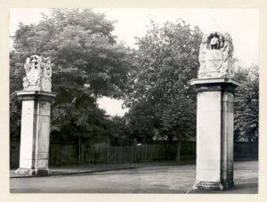 Photograph of Portmore Pillars taken from Thames Street at entrance to Portmore Park road. Circa 1958. Accession No. 370.1974