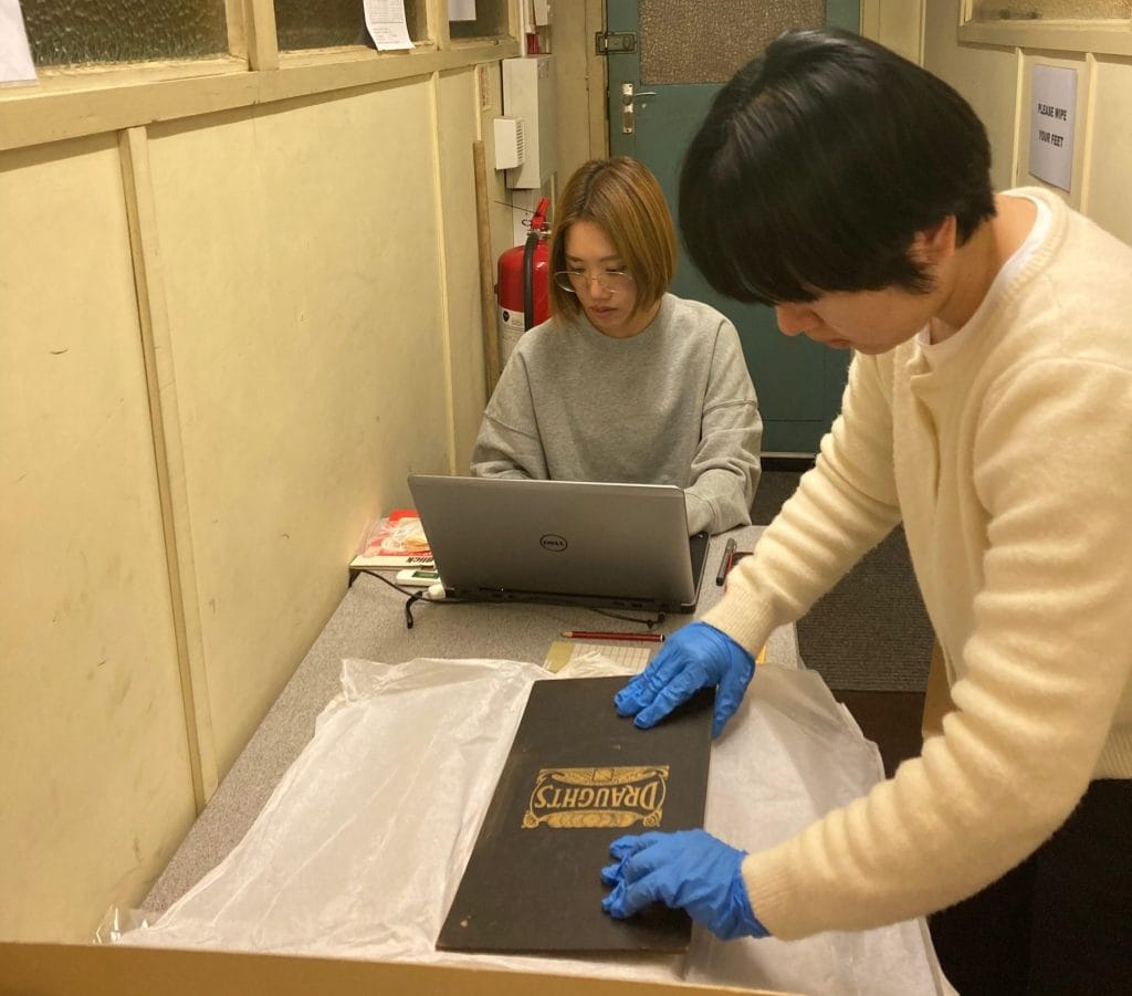 Elly and Cloris auditing items in the Museum store.